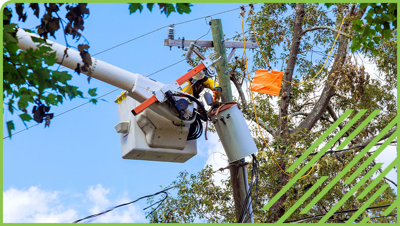 Worker restoring power after a storm 